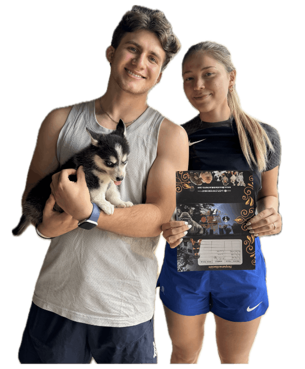 Familia recibiendo cachorro de raza pura en Medellín Colombia criadero certificado